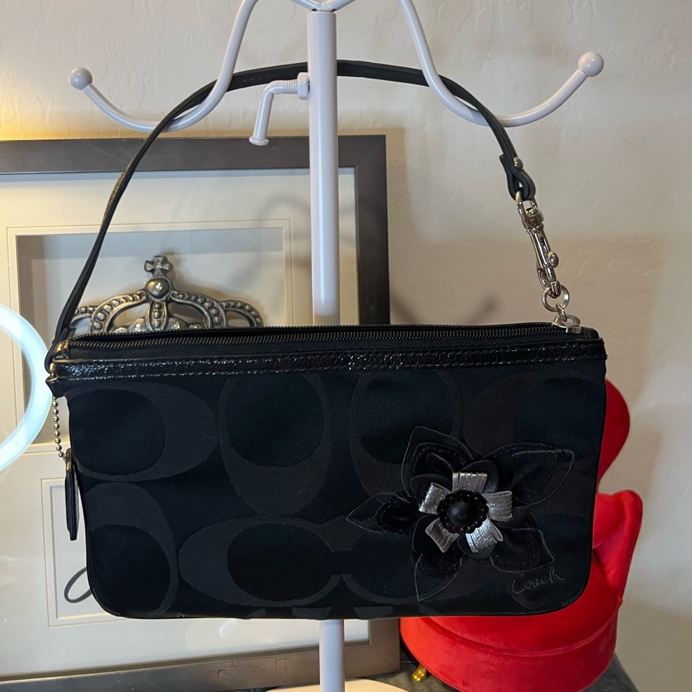 Coach Black Clutch Wristlet with Silver Hardware and flower Accent